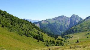 Preview wallpaper mountains, valley, trees, grass, greenery, nature