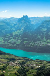 Preview wallpaper mountains, valley, trees, houses, landscape, aerial view