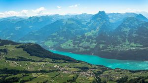 Preview wallpaper mountains, valley, trees, houses, landscape, aerial view