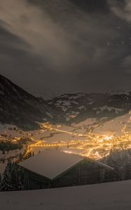 Preview wallpaper mountains, valley, village, snow, night, lights