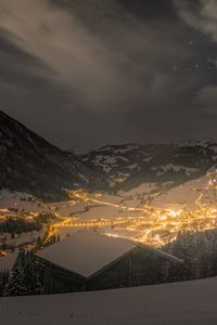 Preview wallpaper mountains, valley, village, snow, night, lights