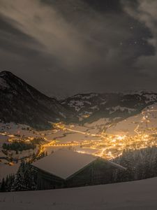 Preview wallpaper mountains, valley, village, snow, night, lights