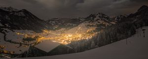 Preview wallpaper mountains, valley, village, snow, night, lights