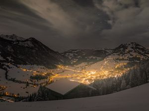 Preview wallpaper mountains, valley, village, snow, night, lights