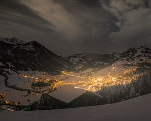 Preview wallpaper mountains, valley, village, snow, night, lights