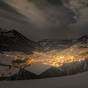 Preview wallpaper mountains, valley, village, snow, night, lights