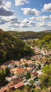 Preview wallpaper mountains, village, buildings, aerial view, valley