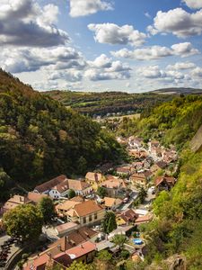 Preview wallpaper mountains, village, buildings, aerial view, valley