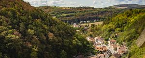 Preview wallpaper mountains, village, buildings, aerial view, valley