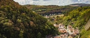 Preview wallpaper mountains, village, buildings, aerial view, valley