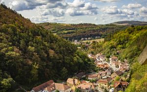 Preview wallpaper mountains, village, buildings, aerial view, valley