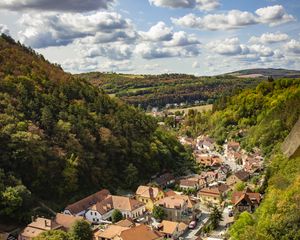 Preview wallpaper mountains, village, buildings, aerial view, valley