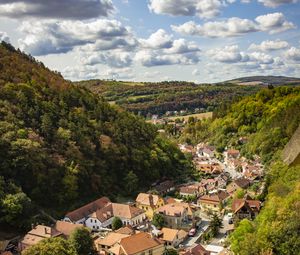 Preview wallpaper mountains, village, buildings, aerial view, valley