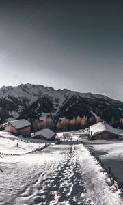 Preview wallpaper mountains, village, winter, snow, path
