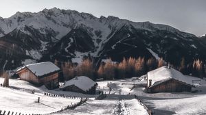 Preview wallpaper mountains, village, winter, snow, path