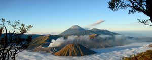 Preview wallpaper mountains, volcanoes, fog, clouds, height, craters, sky