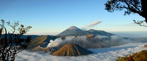 Preview wallpaper mountains, volcanoes, fog, clouds, height, craters, sky