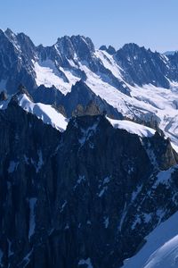 Preview wallpaper mountains, wall, rocks, snow, greatness