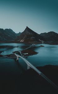 Preview wallpaper mountains, water, road, bridge, gloom