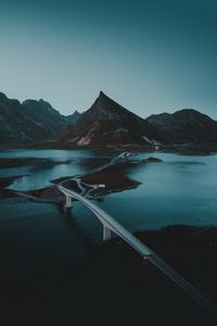 Preview wallpaper mountains, water, road, bridge, gloom