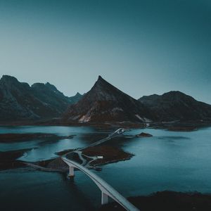 Preview wallpaper mountains, water, road, bridge, gloom