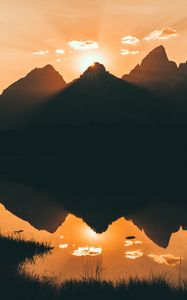 Preview wallpaper mountains, water, sunset, reflection, sunlight, sky