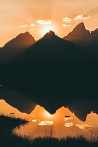 Preview wallpaper mountains, water, sunset, reflection, sunlight, sky