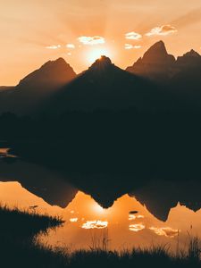 Preview wallpaper mountains, water, sunset, reflection, sunlight, sky
