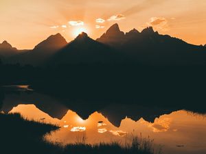 Preview wallpaper mountains, water, sunset, reflection, sunlight, sky