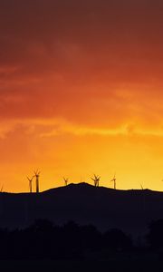 Preview wallpaper mountains, windmills, silhouette, sunset, sky