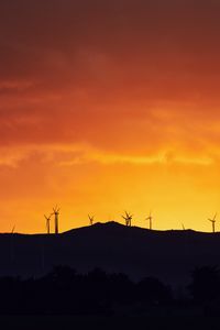 Preview wallpaper mountains, windmills, silhouette, sunset, sky