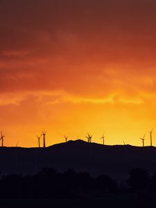 Preview wallpaper mountains, windmills, silhouette, sunset, sky