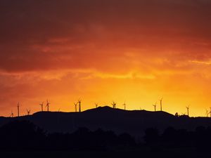 Preview wallpaper mountains, windmills, silhouette, sunset, sky