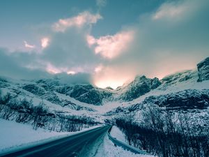 Preview wallpaper mountains, winter, road, snow, clouds, norway