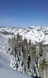 Preview wallpaper mountains, wood, lowland, snow, winter, sky, blue, ate