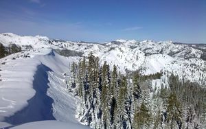 Preview wallpaper mountains, wood, lowland, snow, winter, sky, blue, ate