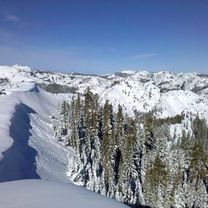 Preview wallpaper mountains, wood, lowland, snow, winter, sky, blue, ate