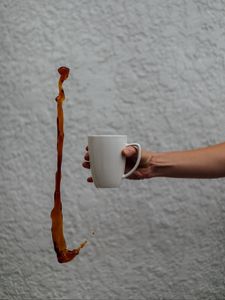 Preview wallpaper mug, coffee, hand, liquid, jet