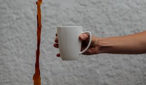 Preview wallpaper mug, coffee, hand, liquid, jet