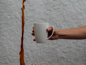 Preview wallpaper mug, coffee, hand, liquid, jet