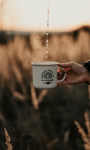 Preview wallpaper mug, hand, drops, steam, drink