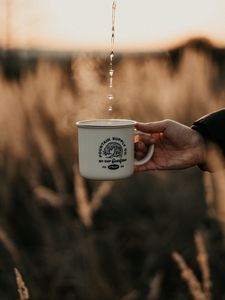 Preview wallpaper mug, hand, drops, steam, drink