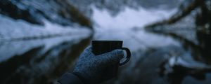 Preview wallpaper mug, hand, glove, nature, mountains