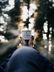 Preview wallpaper mug, hands, inscription, blur