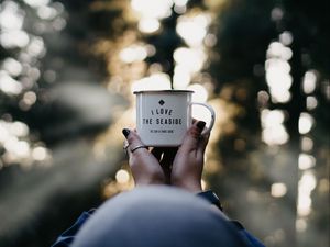 Preview wallpaper mug, hands, inscription, blur