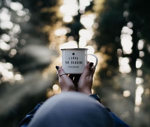 Preview wallpaper mug, hands, inscription, blur