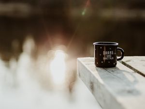 Preview wallpaper mug, pier, lake, sunlight, glare, blur