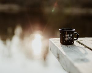 Preview wallpaper mug, pier, lake, sunlight, glare, blur