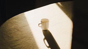 Preview wallpaper mug, table, light, shadow