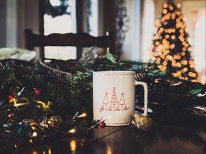 Preview wallpaper mug, tree, garland, decoration, new year, christmas